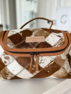Brown & White Cowhide Travel Bag